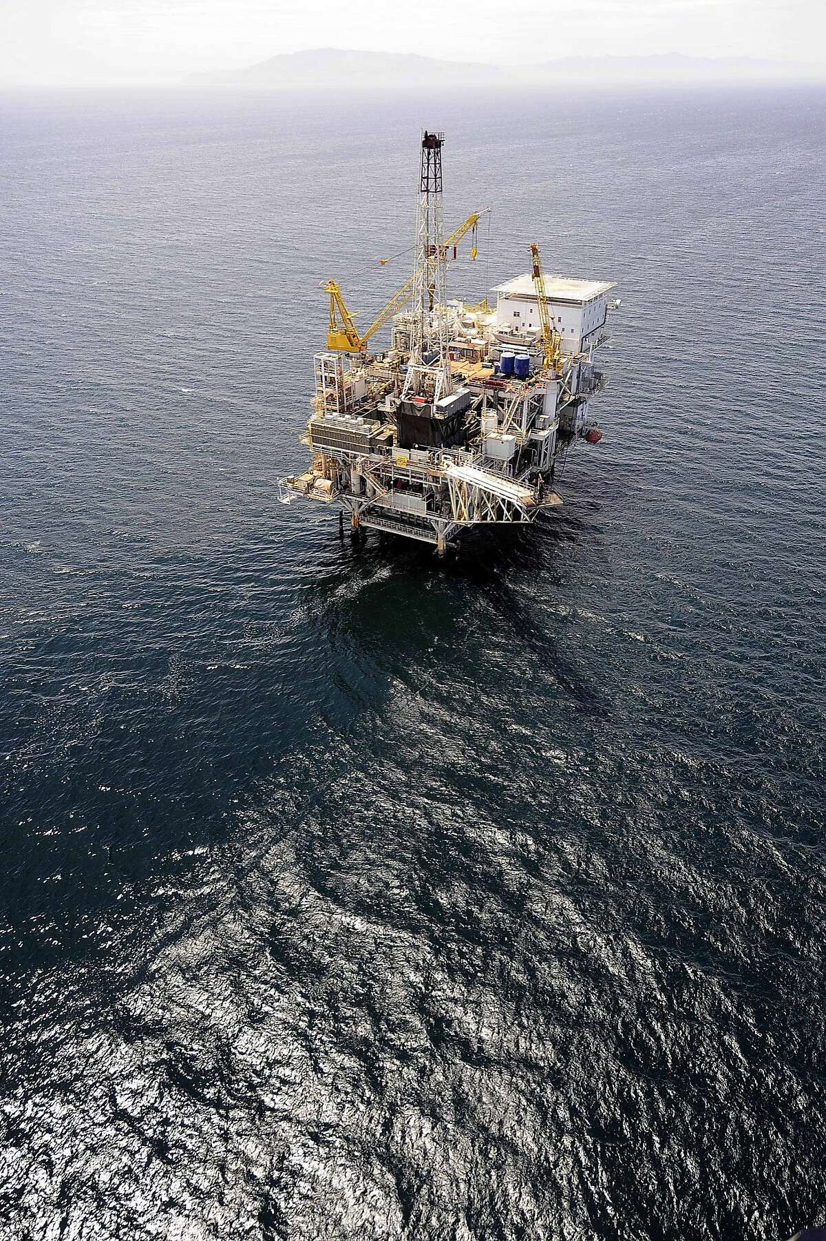 FILE - In this photo taken Friday, May 1, 2009, offshore oil drilling platform "Gail," operated by Venoco, Inc., is seen off the coast of California near Santa Barbara. Nearly two years ago, a broad coalition of environmental groups celebrated a deal with a Texas oil company that promised to eventually end its drilling operations off California's scenic Santa Barbara County coast. Now, a growing number of those eco allies are lining up against the plan, after it became clear that no one outside a small circle of supporters would be allowed to read the final agreement. (AP Photo/Chris Carlson)