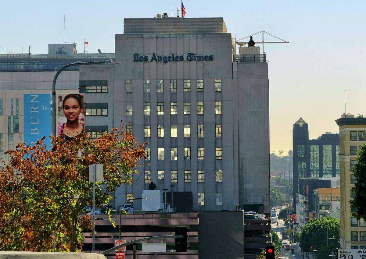 The Los Angeles Times building is seen in downtown Los Angeles on Wednesday, Feb. 7, 2018. Dr. Patrick Soon-Shiong, a biotech billionaire, struck a $500 million deal Wednesday to buy the Los Angeles Times, ending the paper's quarrelsome relationship with its Chicago-based corporate overseers and bringing it under local ownership for the first time in 18 years. (AP Photo/Richard Vogel)