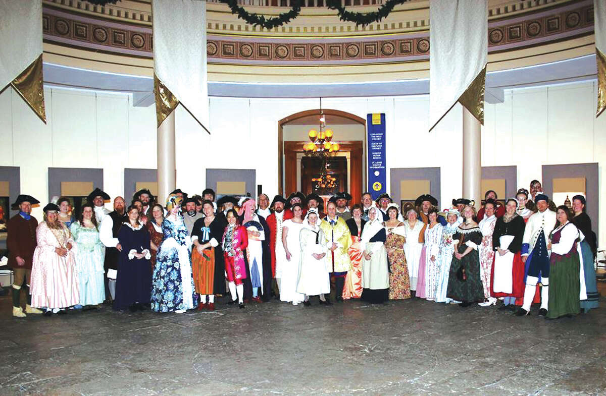 Guests dressed in period costumes at a previous Washington’s Birthday Ball.