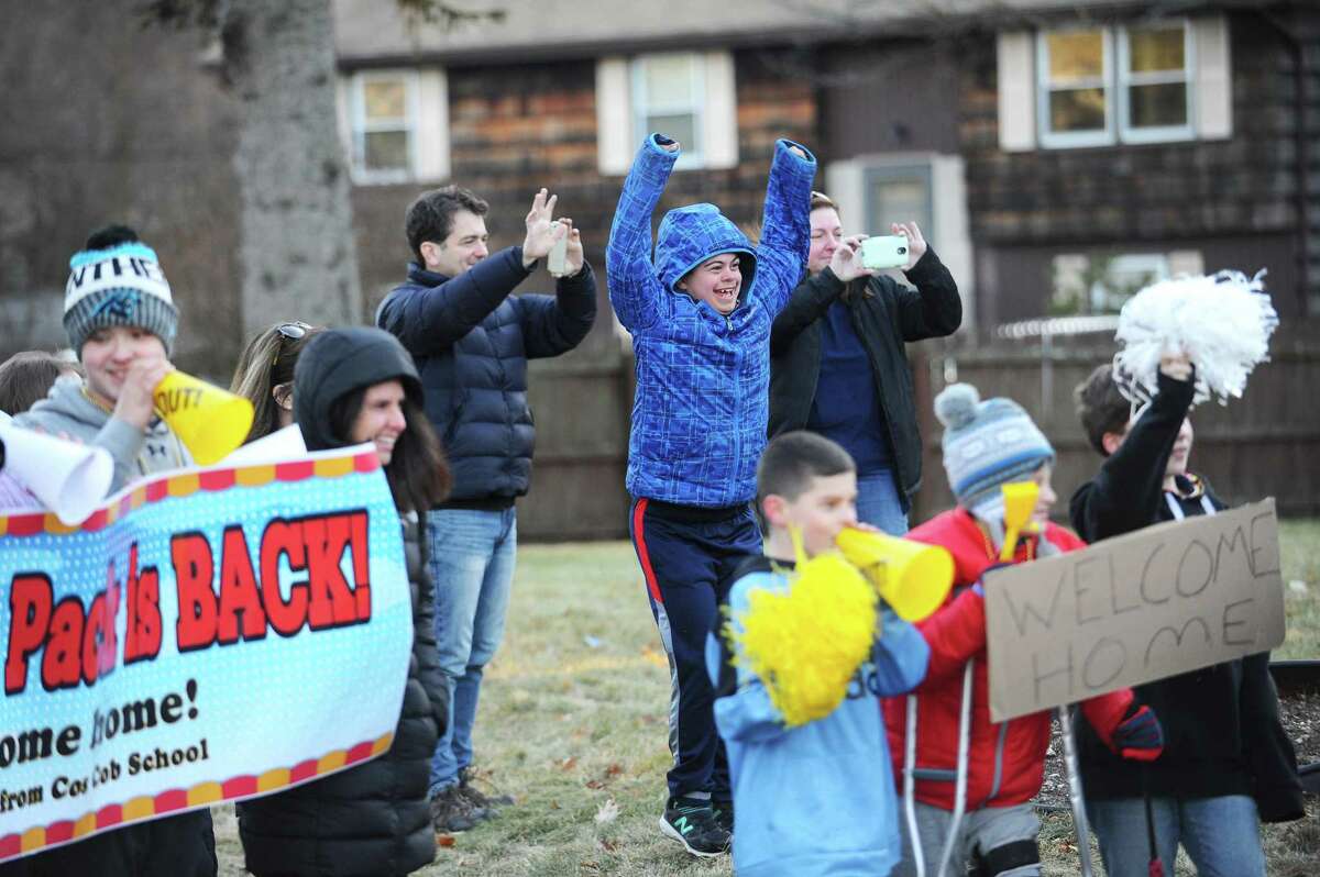 Friends and family welcome home five-year-old Zachary Caldwell Price, and his twin brother Teddy, who is returning home after spending the past six months at Boston Children's Hospital. Photographed at the family's Clorinda Court house in Stamford, Conn. on Monday, Feb. 5, 2018.