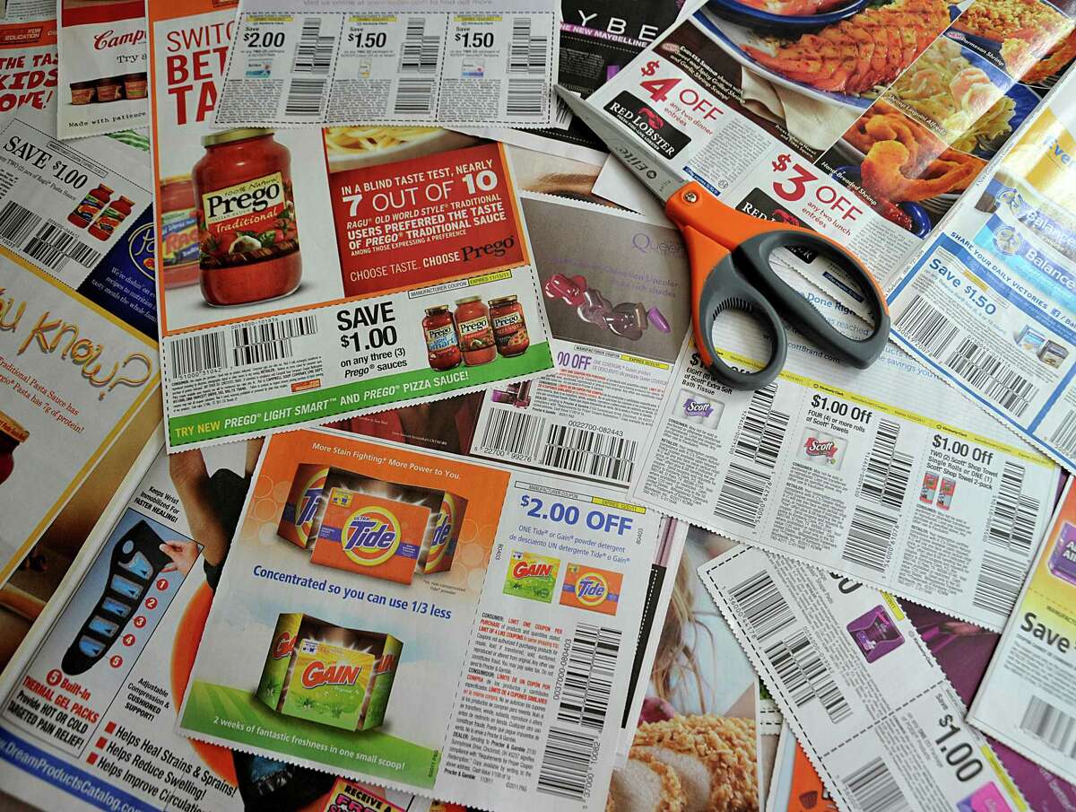 Organizing my coupons by expiration date. I have one envelope for each month and one envelope for the 1st to the 15th. -- Pat