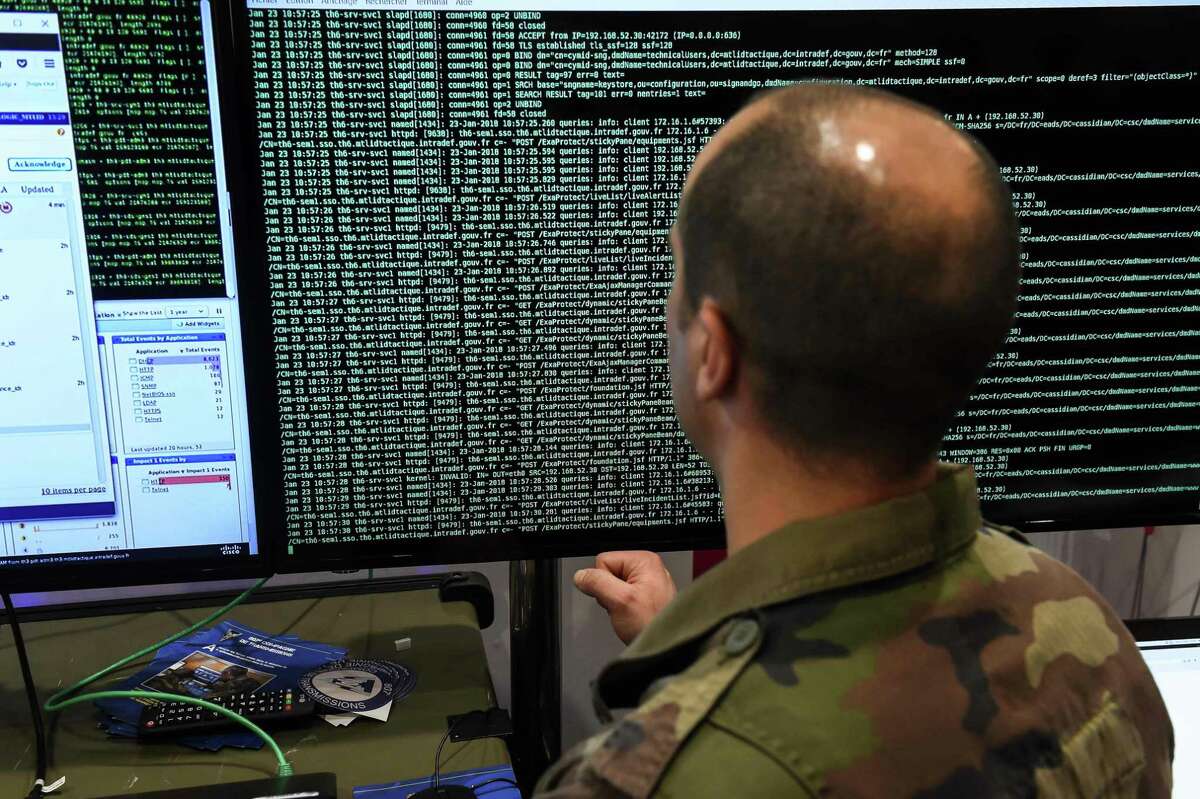 File photo of a member of the military specialised in cyber defense during the 10th International Cybersecurity Forum. Noblis, headquartered in Virginia, is expanding its San Antonio office from 21 to more than 100 employees over the next three years.