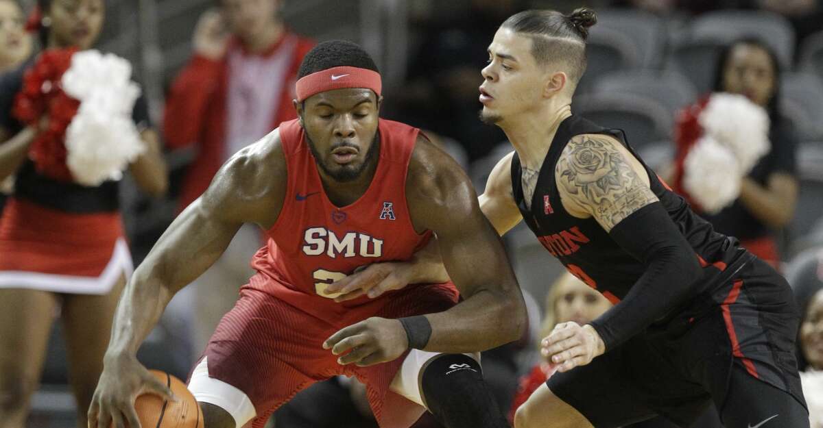 Southern Methodist University Ben Emelogu II works to keep ball from University of Houston Rob Gray during the first half of game at Texas Southern University Thursday, Feb. 8, 2018, in Houston. ( Melissa Phillip / Houston Chronicle )