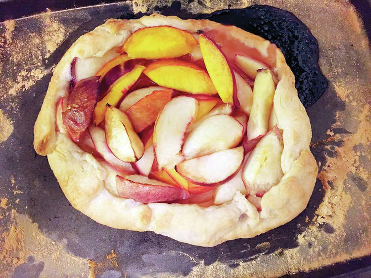Making a peach and nectarine tart is a fairly simple process with tasty results.