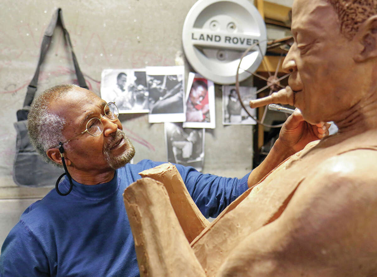 Sculptor Preston Jackson created the bronze Miles Davis statue from an iconic Miles photograph.