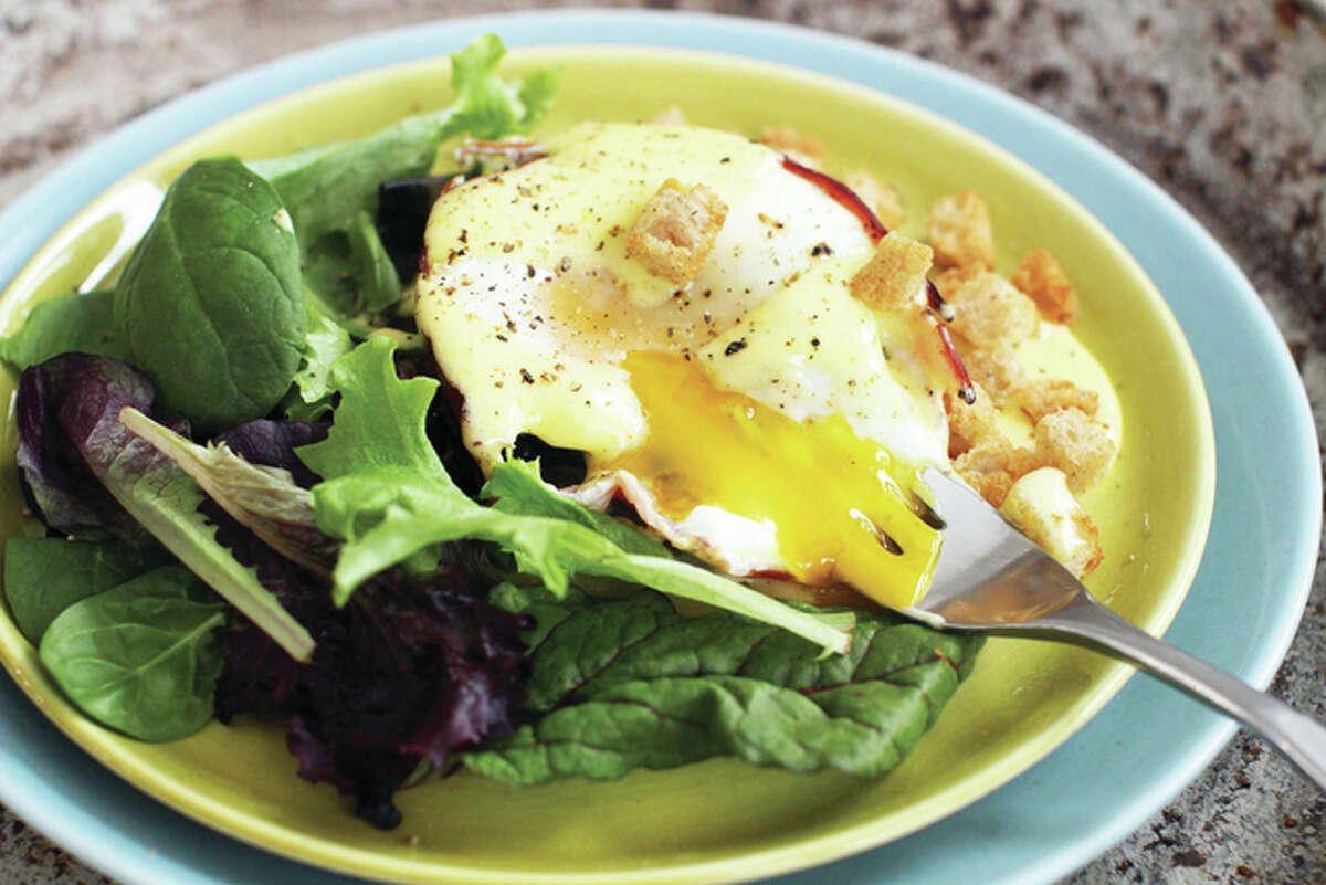 This version of the classic eggs Benedict brunch recipe saves time by letting the home cook prep many of the steps in advance, then finish and assemble the dish just before serving.
