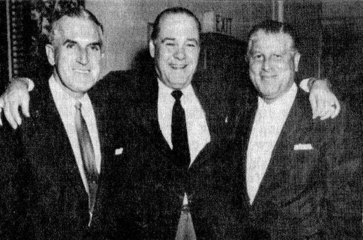 Meredosia native Frank Skinner (1897-1968) stands between two Universal Pictures executives in the 1950s. Skinner made it big on Broadway and in Hollywood as a composer and arranger of music.