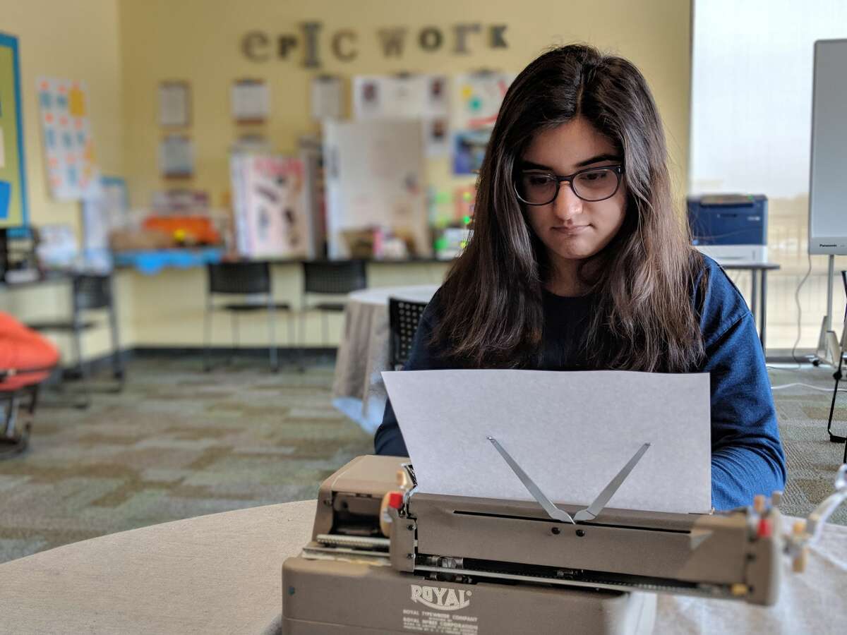 Jessica Khera, 15, types on a Royal typewriter that Tom Hanks sent her. Khera said she was inspired to reach out to Hanks after reading his book "Uncommon Type," a book of short stories written by the actor.