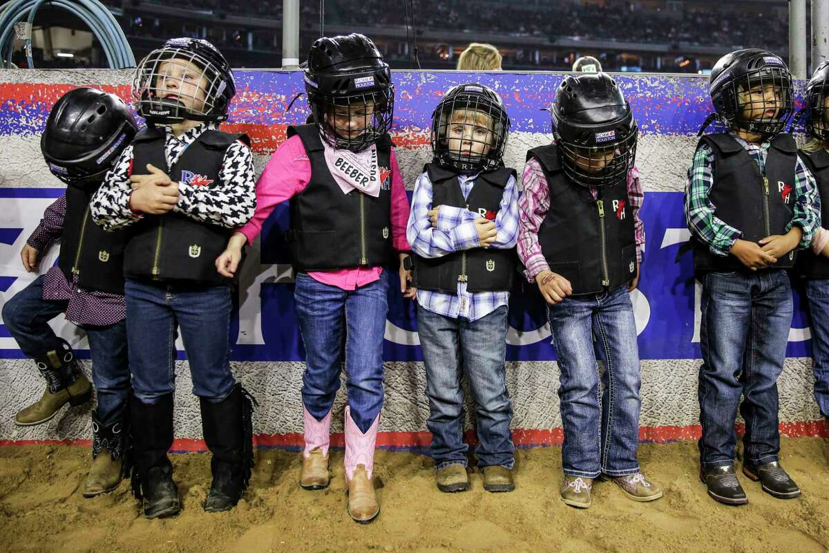 Kids line up as they prepare to compete in the mutton bustin' event during round three of Super Series V at the Houston Livestock Show and Rodeo Tuesday, March 21, 2017 in Houston. ( Michael Ciaglo / Houston Chronicle )