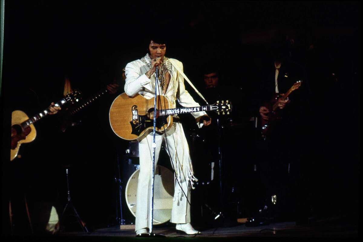 03/01/1970 - singer Elvis Presley performs at the 1970 Houston Livestock Show and Rodeo in the Astrodome. Presley made six appearances over three days at the Houston rodeo. His Saturday evening performance broke all rodeo attendance records with a crowd of 43,614. Â Houston Chronicle