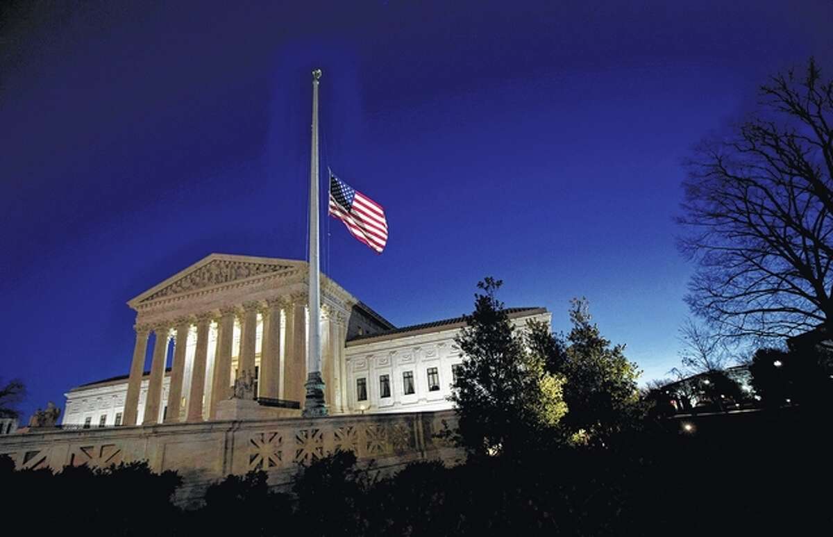 A U.S. flag flies at half-staff in front of the U.S. Supreme Court in Washington after the death of Supreme Court Justice Antonin Scalia. The U.S. Flag Code allows presidents and governors to lower flags for officials, military members and certain occasions, though some states have their own broader policies. And even as some states have moved to tighten their rules, others faced criticism for withholding the tribute. Manuel Balce Ceneta | AP