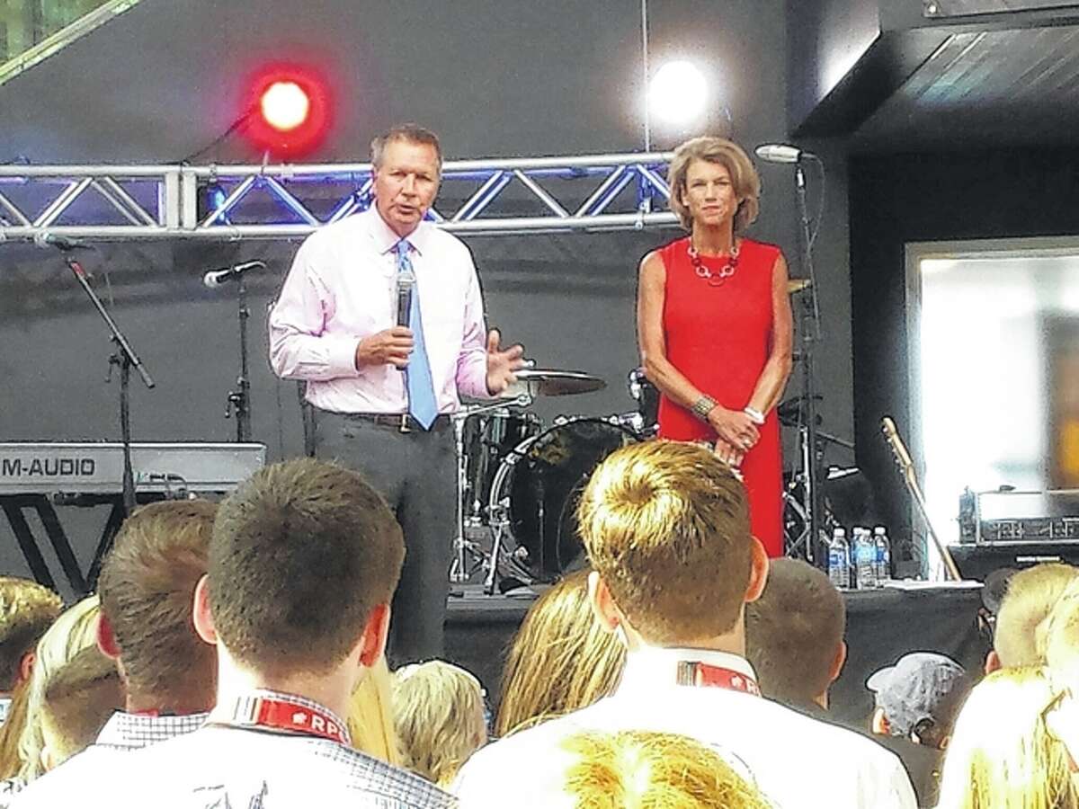 Ohio Gov. John Kasich, the last opponent to quit the Republican race for president, and his wife, Karen, thank supporters during an event at the Rock and Roll Hall of Fame in Cleveland. Kasich said the campaign “changed” him, calling for people to believe in themselves and work to make a difference.