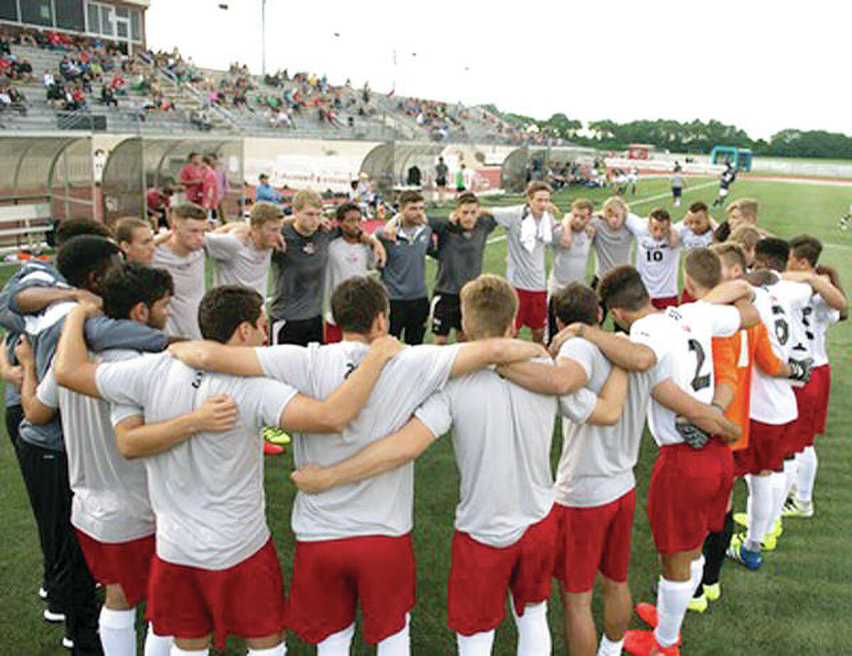 Members of the SIUE men’s soccer team huddle before a game against Notre Dame last season at Korte Stadium. The Cougars will join the Mid-American Conference for men’s soccer and wresting beginning with the 2018 season.