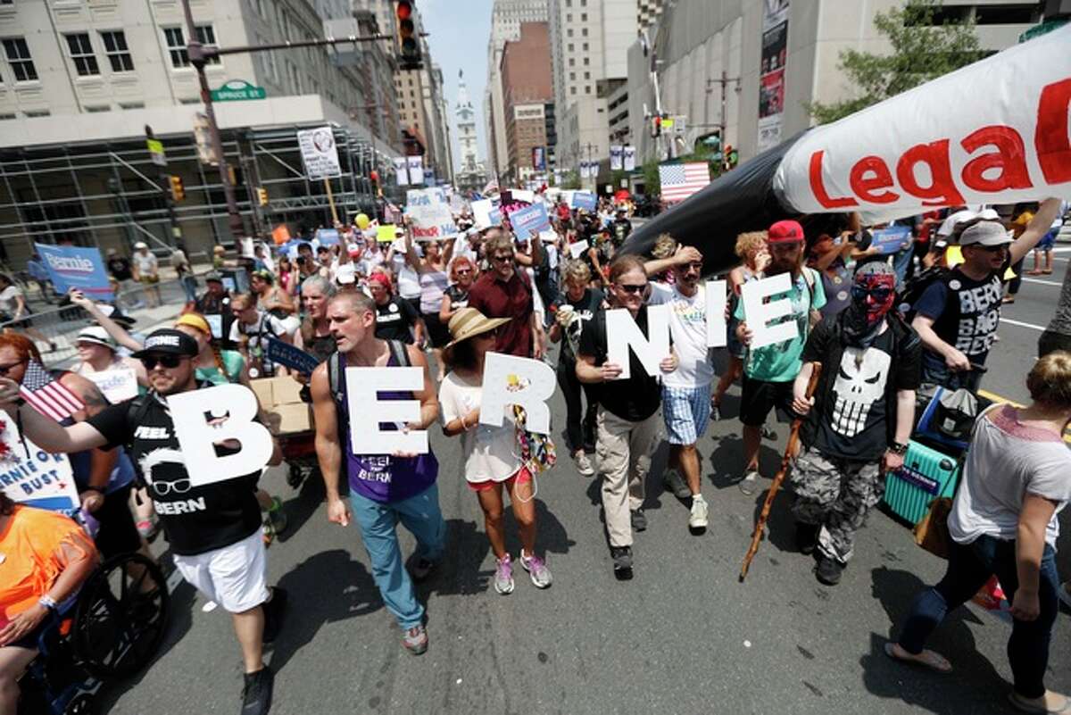 Supporters of Sen. Bernie Sanders march during a protest in downtown Philadelphia on, Monday, July 25, 2016, during the first day of the Democratic National Convention. (AP Photo/John Minchillo)