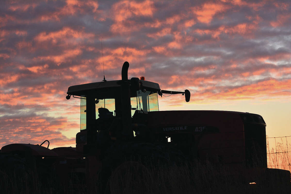Jeff Ruzicka | Reader photo A tractor rests in a field in Pike County as night approaches.