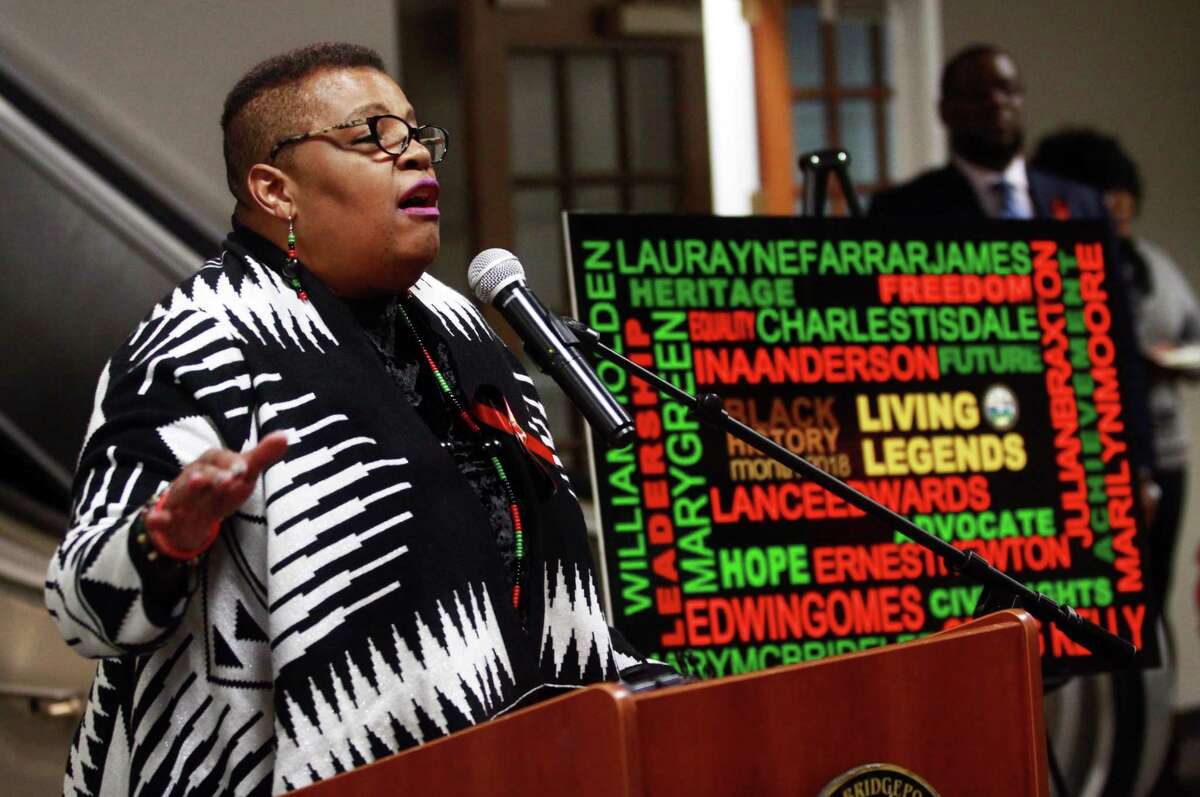 Rev. Ina Anderson sings the National Negro Anthem "Lift Every Voice and Sing" during the Margaret E. Morton Goverment Center's First Annual Bridgeport "Living Legends" Recognition Ceremony in Bridgeport, Conn., on Thursday Feb. 8, 2018. Mayor Joe Ganim and the City of Bridgeport honored 12 unsung African American heroes from the Bridgeport community for Black History Month. Rev. Anderson was one of the 12 who was honored. Actor and activist Tenisi Davis gave remarks. Davis, a Bridgeport native, appears on the CBS show Blue Bloods. Spoken Word and musical selections were performed by students at the University of Bridgeport's Sophisticated Love of the Artistic Mind Club (SLAM). Local artisans Nanette Malone, Gale Clay and others sold their jewelry, crafts and artwork.