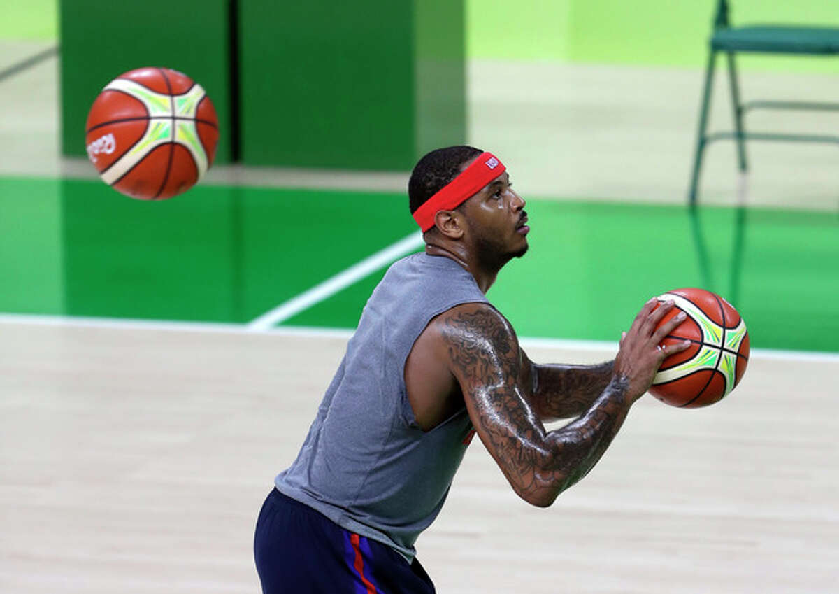 United States' Carmelo Anthony shoots during a basketball practice session for the 2016 Summer Olympics in Rio de Janeiro, Brazil, Thursday, Aug. 4, 2016. (AP Photo/Eric Gay)