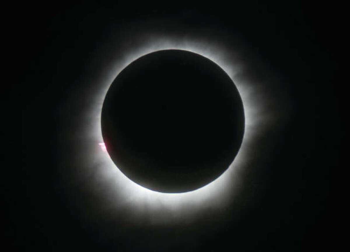This March 9, 2016, file photo shows a total solar eclipse in Belitung, Indonesia. A solar eclipse on Monday is set to star in several special broadcasts on TV and online. PBS, ABC, NBC, NASA Television and the Science Channel are among the outlets planning extended coverage of the first solar eclipse visible across the United States in 99 years.