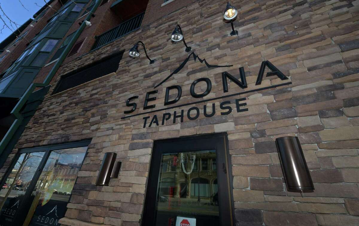 Sedona Taphouse is one off the three restaurants at the Waypointe mid-block development THursday, Febraury 8, 2018, that has signage along West Ave. in Norwalk, Conn. Without rules in place, Norwalk city staff and elected officials are wrestling with a request from the owner of the Waypointe mid-block apartment complex to place advertising banners on city light poles along West Avenue, Merwin and Orchard streets. Restaurants and shops located in the inner courtyard/pedestrian street within Waypointe want the banners to advertise themselves. The Common Councils Public Works Committee on Tuesday evening rejecting granting the Waypointe owner an encroachment permit amid concerns about commercialization, safety, upkeep and maintenance and lack of an overall plan by the city for advertising on light poles.