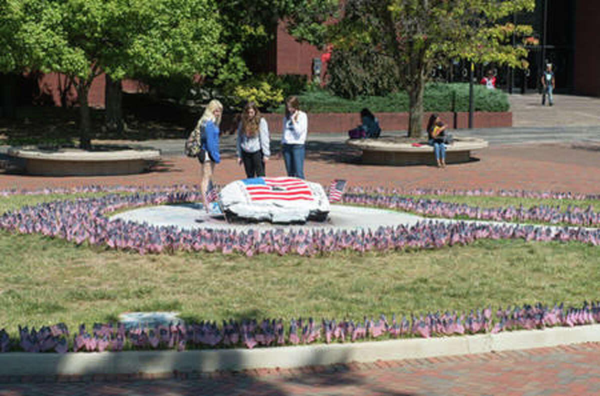 The College Republicans of SIUE placed 2,977 flags around The Rock to symbolize each life lost in the 9/11 terrorist attacks.