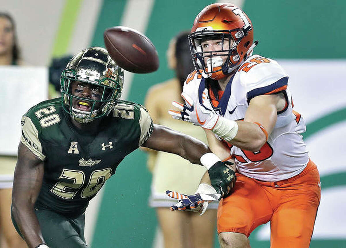 llinois running back Mike Epstein, right, pulls in a 21-yard touchdown pass in front of South Florida safety Devin Abraham during the fourth quarter of a game earlier this season in Tampa, Fla. When Lovie Smith became coach at Illinois, it was clear that he was taking over a struggling program. In his first year of his rebuilding project Smith relied heavily on upperclassmen, but this time around he’s placed a lot of responsibility in the hands of his youths.