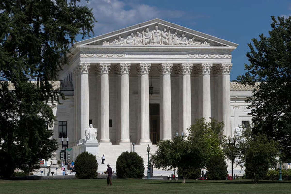 In this June 26, 2017 photo, The Supreme Court is seen in Washington. A Supreme Court with a reconstituted conservative majority is taking on a new case with the potential to financially cripple Democratic-leaning labor unions that represent government workers. The justices deadlocked 4-4 in a similar case last year.