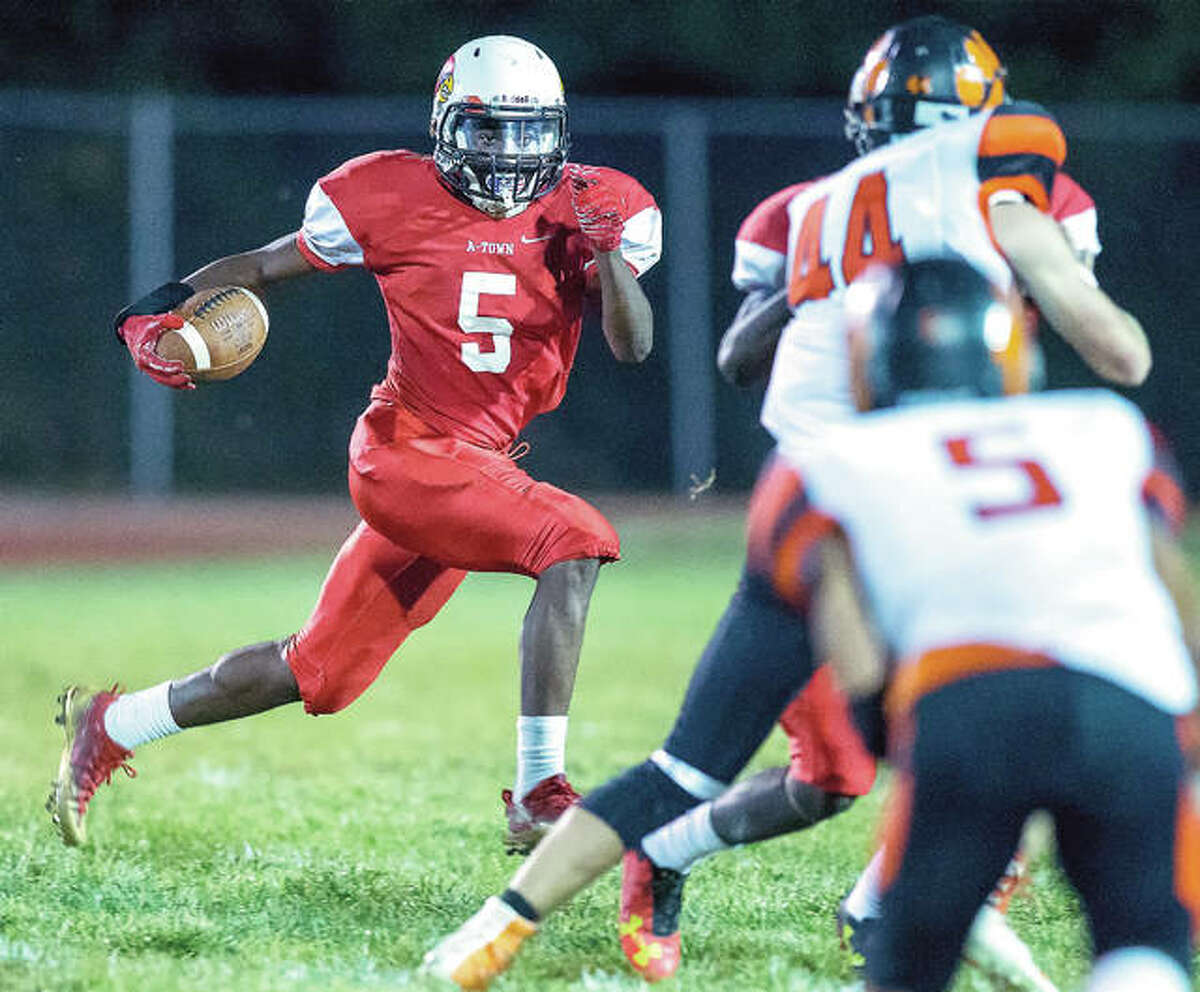 Alton’s Darrell Smith (5) has been named to the Illinois High School Football Coaches Association Class 7A All-State Team. Smith, gained 1,324 yards rushing on 126 carries and scored 17 touchdowns.