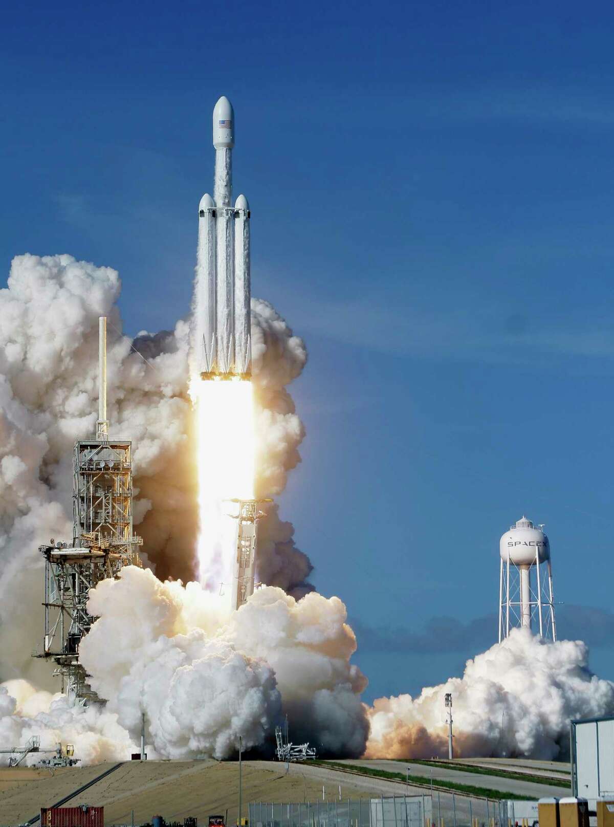 With Falcon Heavy launch, should NASA continue building its own rocket?