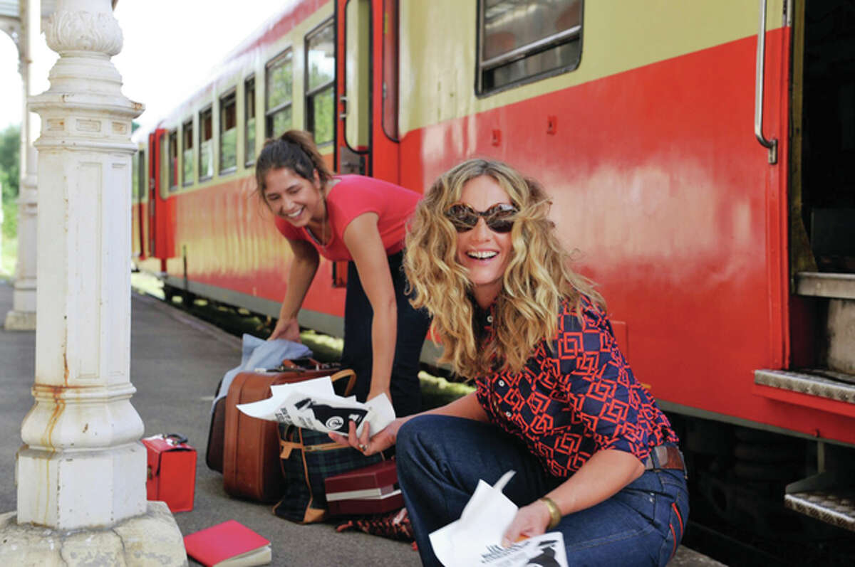 Cécile De France (right) as Carole and Izïa Higelin as Delphine are shown in a scene from the 2015 French film “Summertime.”