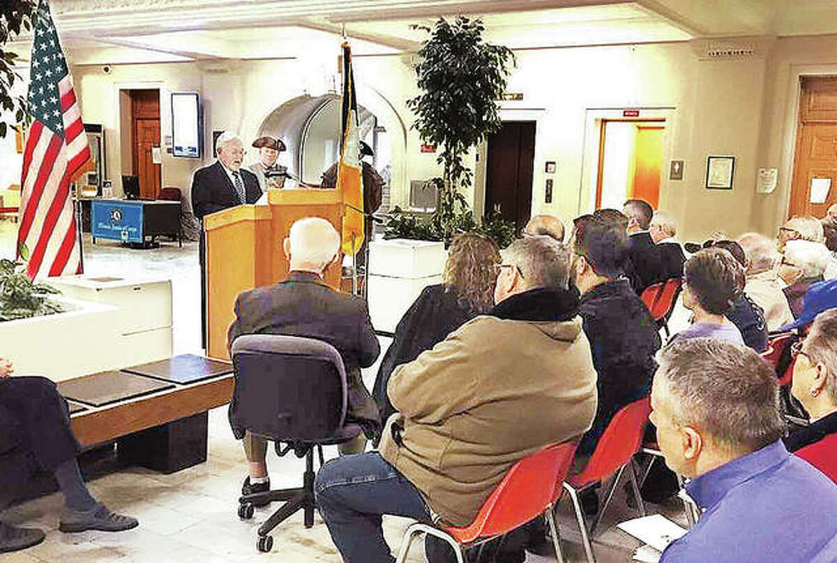 David File, General George Rogers Clark Chapter Flag Award Chairman, speaks during Thursday’s ceremony at the Madison County Courthouse. This is the 21st year the Sons of the American Revolution have honored Madison County residents who consistently fly the American flag.
