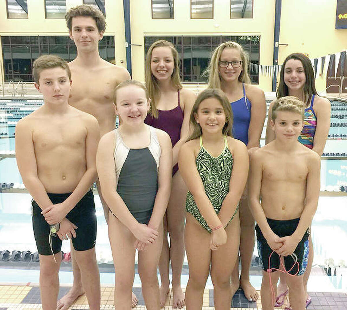 Tri-City Area Tidalwaves swimmers who placed in the top three of their age group at the recent TCAY All-Around Invitational at Principia included: Back, from left: Claire Pohlman, Anna Moehn and Ceci Parker. Front row from left: Christian Kotzamanis, Addison Kenney, Mia Lopez and Nathan Kotzamanis. Missing are Noah Clancy and Abby Powers.