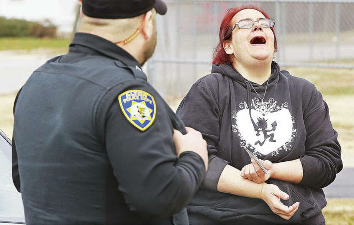 Anderson reacts with relief after learning she was not going to get a traffic ticket.