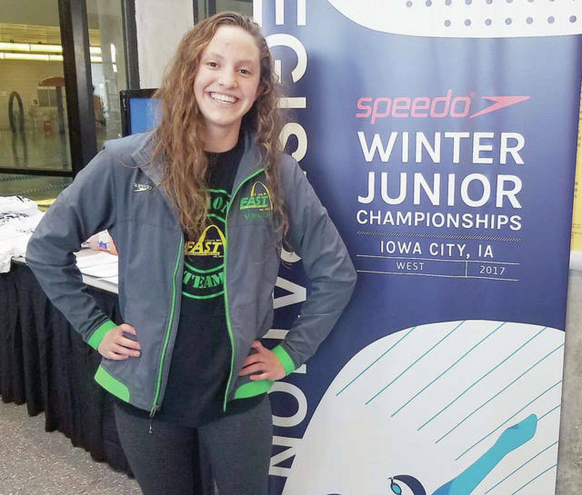 Eleni Kotzamanis, 14, of Godfrey is making waves as a member of the Flyers Aquatic Swim Team in St. Louis. She is pictured at the recent Speedo Winter Junior Championships in Iowa City, Iowa.