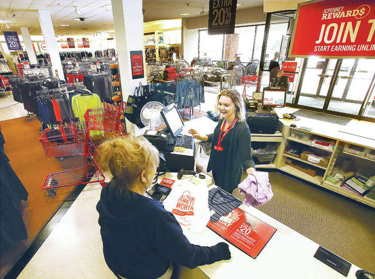 In this photo from March, happy sales associate Shelby Sasek waits on a customer at the JCPenney store in Alton Square Mall after company officials announced the Alton location wasn’t among those it was eyeing for closure. After it was made public Thursday that a St. Louis location would be closing in January, a company spokesman confirmed Friday that the Alton store is staying open.