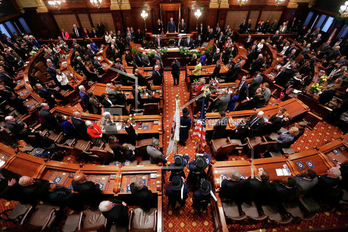 This Jan. 14, 2015 file photo shows the the Senate chamber at the State Capitol, in Springfield Ill. t was a big year in the Illinois statehouse with lawmakers ending an historic budget impasse and approving an income tax hike, overhauling how public schools get funding and allowing automatic voter registration. Now, a fresh set of 215 laws takes effect Jan. 1, 2018. The laws cover numerous topics, including the expansion of taxpayer-funded abortions, celebrating Barack Obama’s presidency, allowing tax credits for private school scholarships, criminal justice reforms and a circus-related ban. (AP Photo/Seth Perlman File)