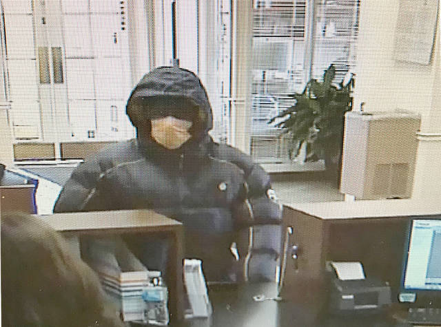 Police: Wood River robbery suspect wore surgical mask, fled in red 4-door