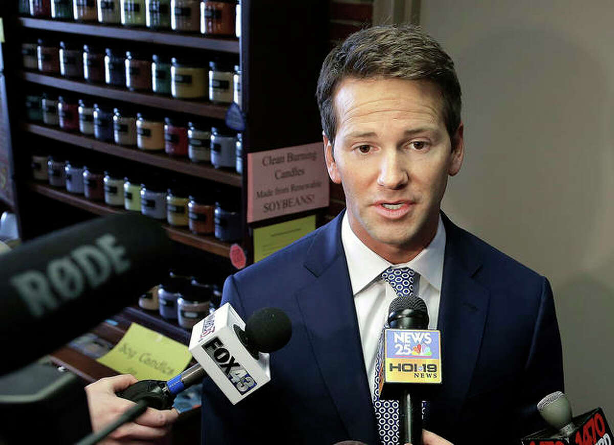 Seth Perlman | AP Former Rep. Aaron Schock speaks to reporters in Peoria in 2016. Attorneys for former Schock say a staffer secretly provided the government with a trove of confidential documents in violation of his right against unreasonable search and seizure. The lawyers write in court filings that the government went too far when it made the staffer an informant, requiring him to wear a wire to record conversations.