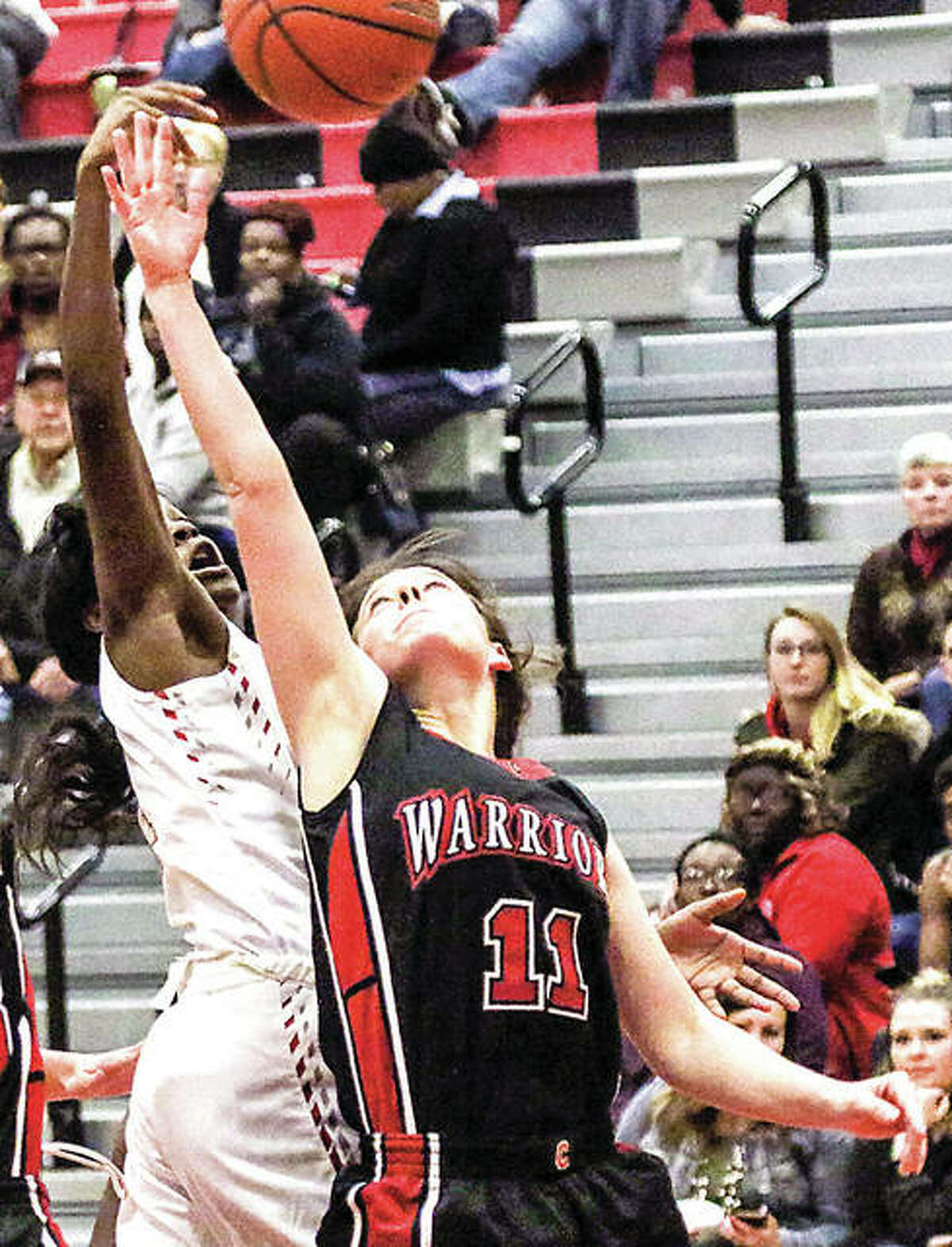 Emily McBride of Calhoun (11) led the Warriors with 14 points in 1 49-44 loss to Brown County Wednesday night in Mount Sterling. She is shown in action earlier this season.
