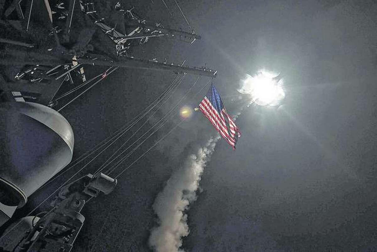 Ford Williams | U.S. Navy The guided-missile destroyer USS Porter launches a tomahawk land attack missile in the Mediterranean Sea. The United States blasted a Syrian air base with a barrage of cruise missiles in retaliation for this week’s chemical weapons attack against civilians.