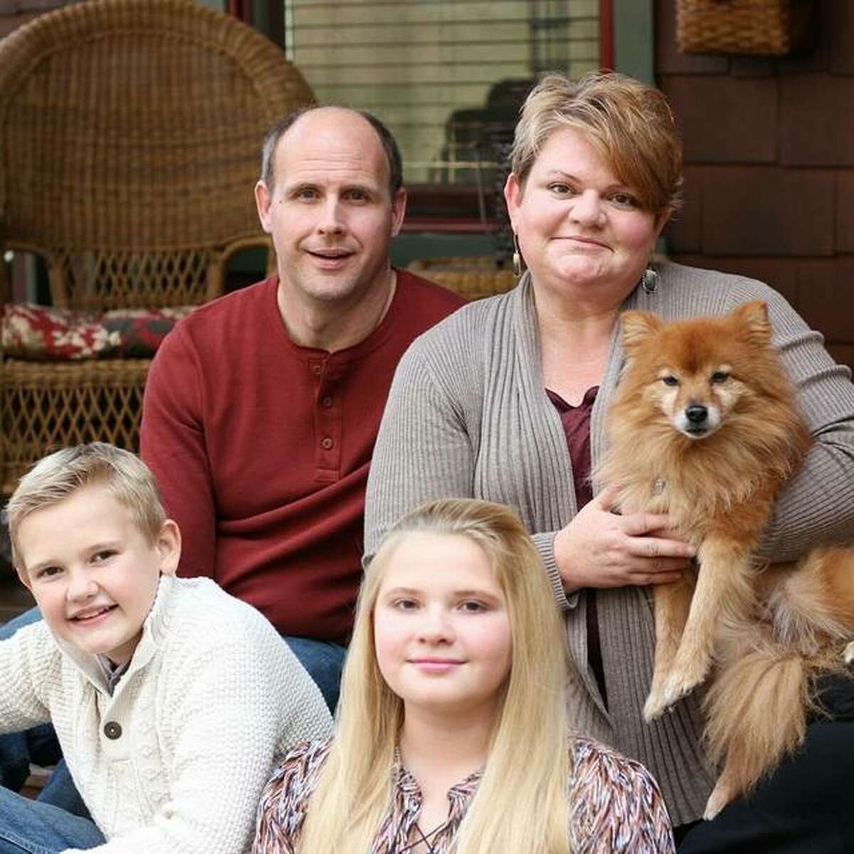 Brian Hanson with his wife, Amy, son Ben and daughter Haley, plus their dog Chewie.