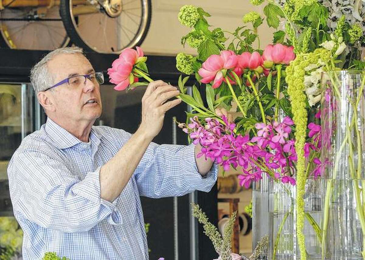 Teresa Crawford | AP Rick McVey, owner of Dilly Lily, works at his shop in Illinois. If the Trump administration’s plan to lower tax rates becomes law, it will likely benefit McVey. The florist has a range of possibilities, not just from the prospect of lower taxes, but that hed get more business from customers who have more money to spend.