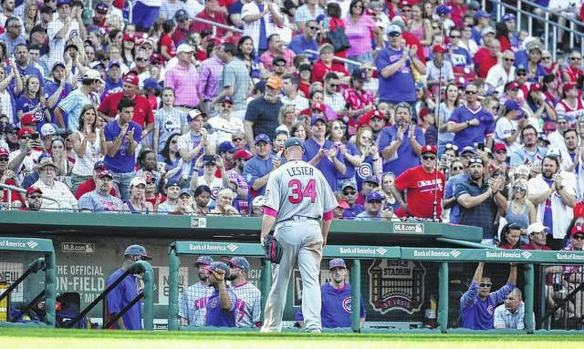 Chicago Cubs starting pitcher Jon Lester (34) exits the game to a standing ovation from Cubs fans during the sixth inning of a baseball game against the St. Louis Cardinals Saturday in St. Louis.