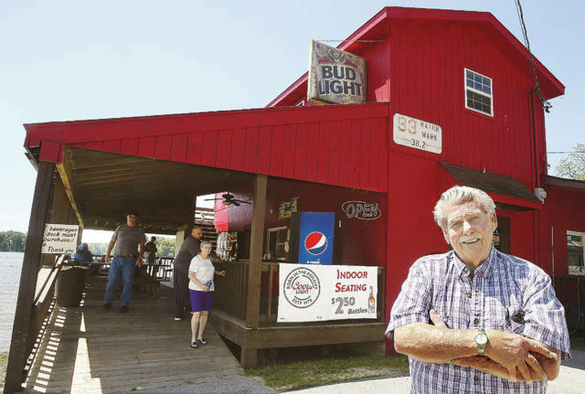 Oliver Ready, co-owner of O’Jan’s Fish Stand on Main Street in Grafton, stands in front of the restaurant, which has been in business for 50 years.