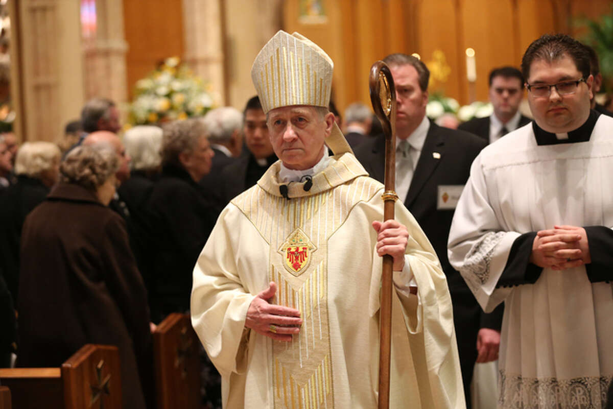 In this Thursday, April 23, 2015, photo, Chicago Archbishop Blase Cupich processes from Holy Name Cathedral following the funeral Mass of Cardinal Francis George in Chicago. Monsignor Cupich was among the 17 new cardinals named by Pope Francis, Sunday, Oct. 9.