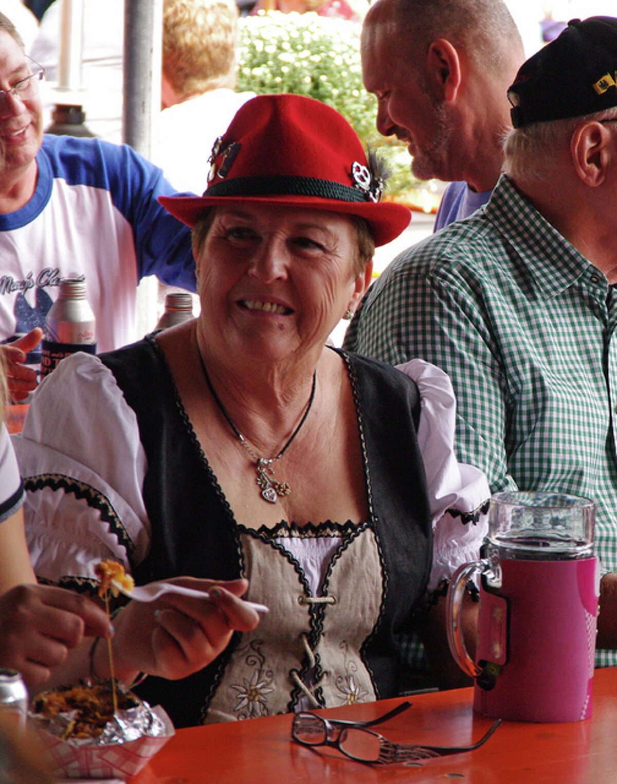 Marilyn Kuhn, of Godfrey, enjoys the St. Mary’s Oktoberfest in Alton Sunday.