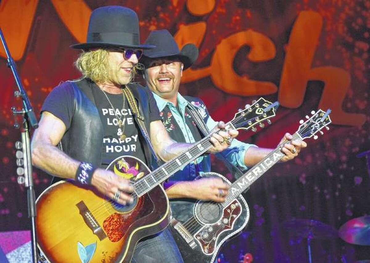 Big Kenny (left) and John Rich of Big and Rich perform Saturday at the Morgan County Fair. More photos of the concert and of the opening act, Drew Baldridge, are available at myjournalcourier.com — here and here.