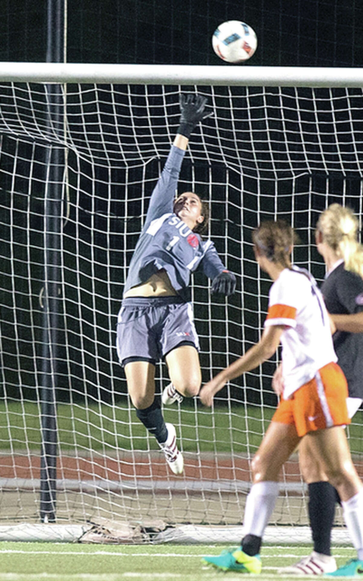 SIUE goalie Juli Rossi made nine saves, including one in sudden-death penalties, helping the Cougars oust No. 11-ranked Notre Dame in the first round of the NCAA Division I Women’s Soccer Tournament Friday night at Notre Dame. She is shown making a save in action earlier this season.