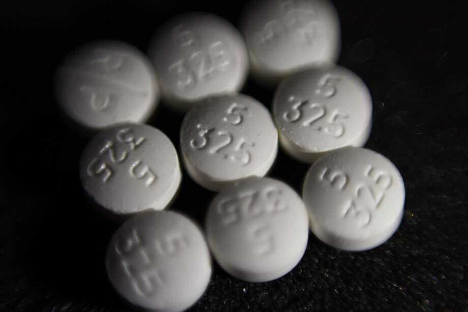FILE - This Tuesday, Aug. 15, 2017 file photo shows an arrangement of pills of the opioid oxycodone-acetaminophen, also known as Percocet, in New York. Cities and counties of all sizes have sued companies that make and distribute prescription opioids. Among the plaintiffs so far: Philadelphia; the state of Ohio; Princeton, West Virginia; the Cherokee Nation; and a consortium of counties across Wisconsin. (AP Photo/Patrick Sison) Photo: Patrick Sison, Associated Press