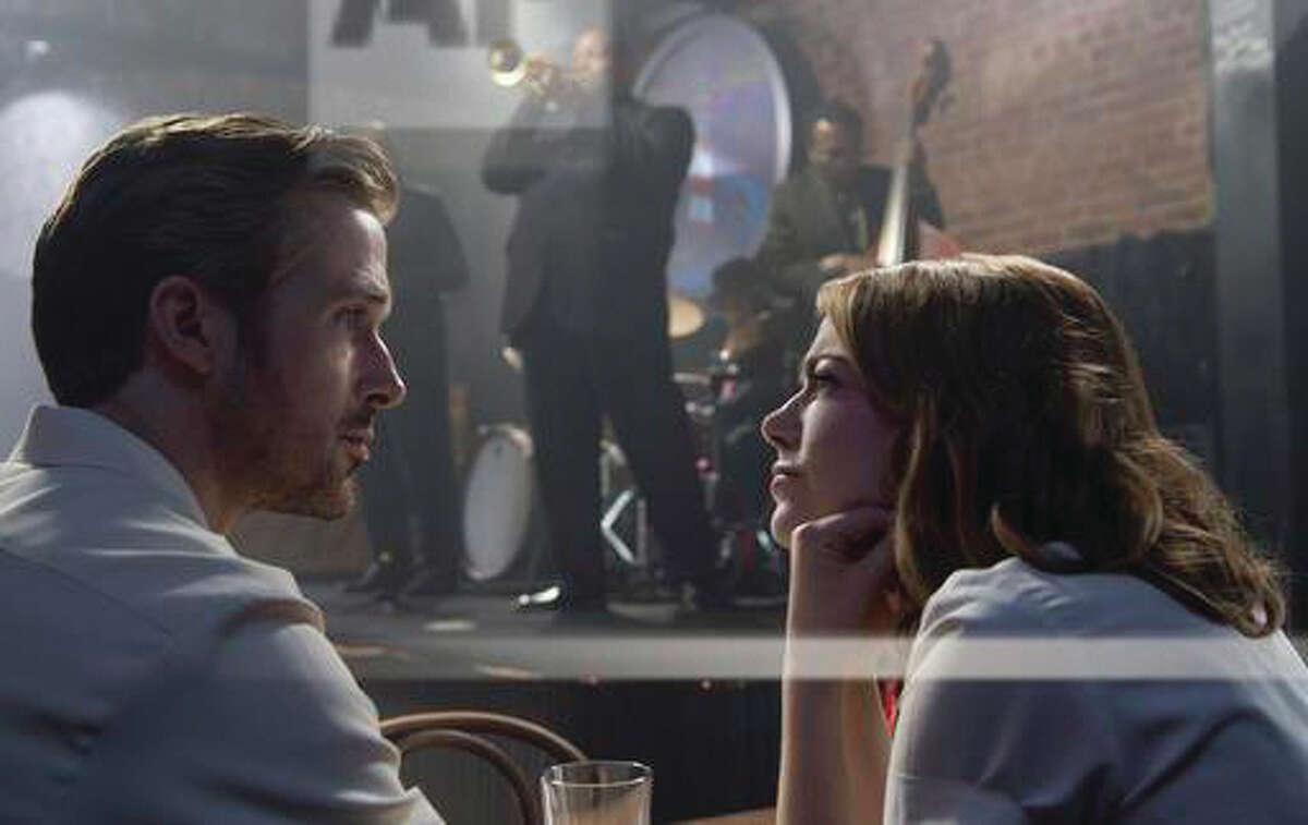 This image released by Lionsgate shows Ryan Gosling, left, and Emma Stone in a scene from "La La Land." The film was nominated for a Golden Globe award for best motion picture musical or comedy on Monday. The 74th Golden Globe Awards ceremony will be broadcast Jan. 8 on NBC. (Dale Robinette/Lionsgate via AP)