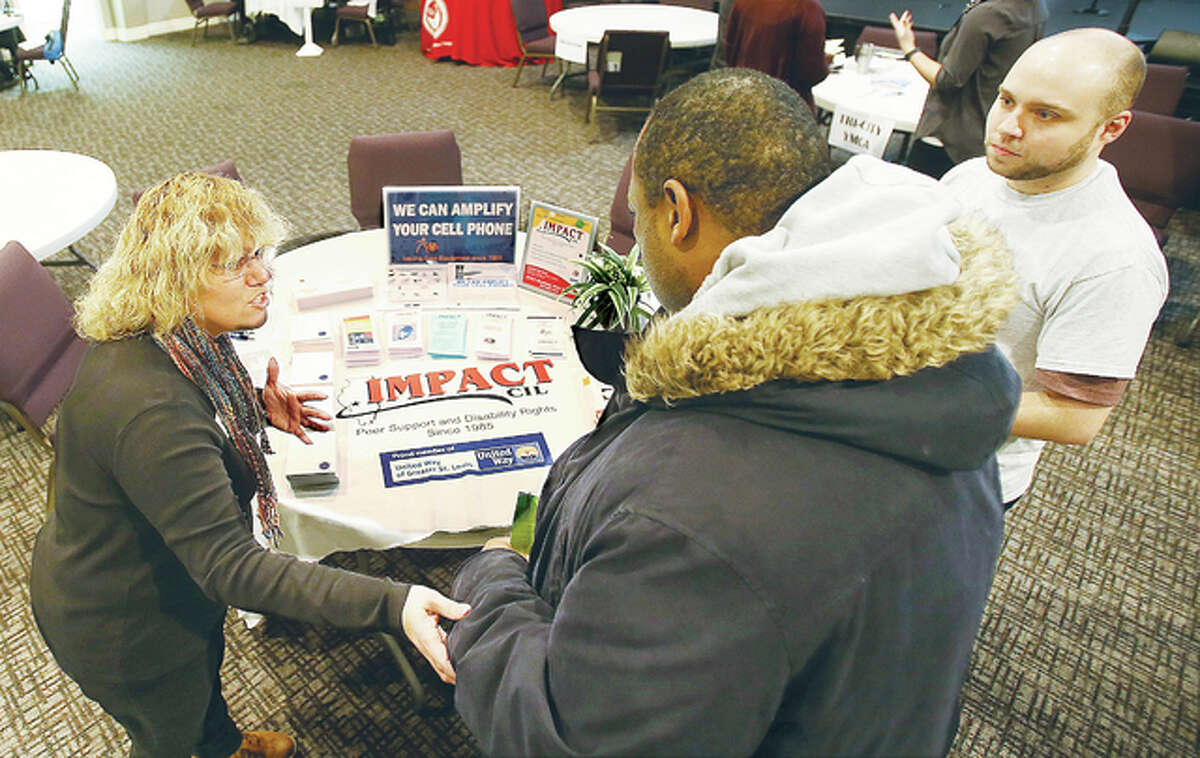 Members of IMPACT talk to a participant in the 2019 Homeless Connect at River of Life Church. Madison County will hold its annual Project Homeless Connect from 10 a.m. to 3 p.m., Friday, Jan., 27 at the church on Fosterburg Road in Alton. The project is a nation-wide effort to provide services to the homeless organized locally by the Madison County Partnership to End Homelessness.